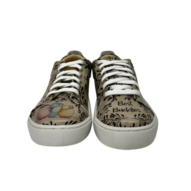 Adorable sneaker with a painted pattern of little birds.  