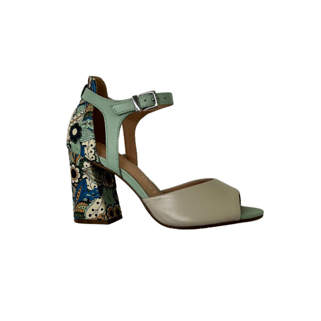 Outside view of a dressy sandal.  Cream, light green and floral