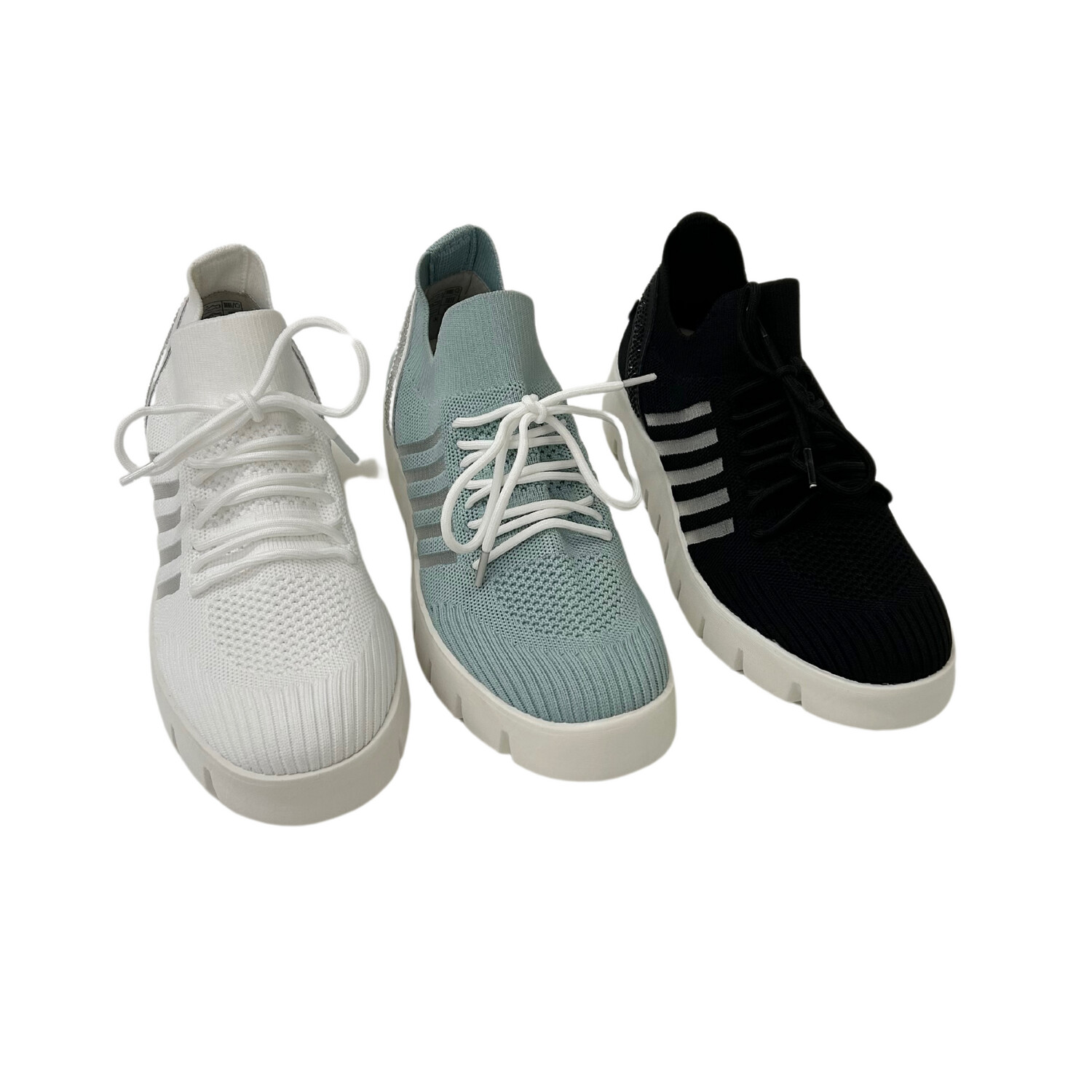 Adorable slip on sneaker with a textile upper and laces  to snug it up.  Shown in 3 colors - white, blck and light blue