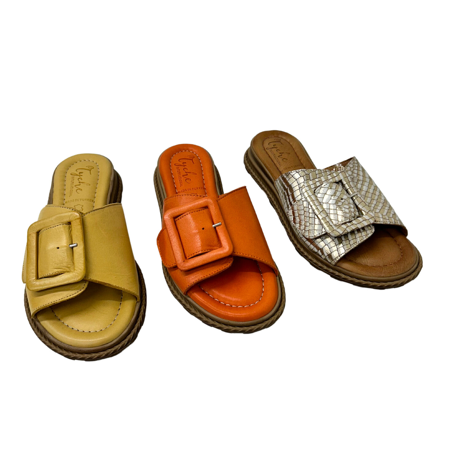 Front view of a flat mule in 3 colors - orange, mustard yellow and a metallic