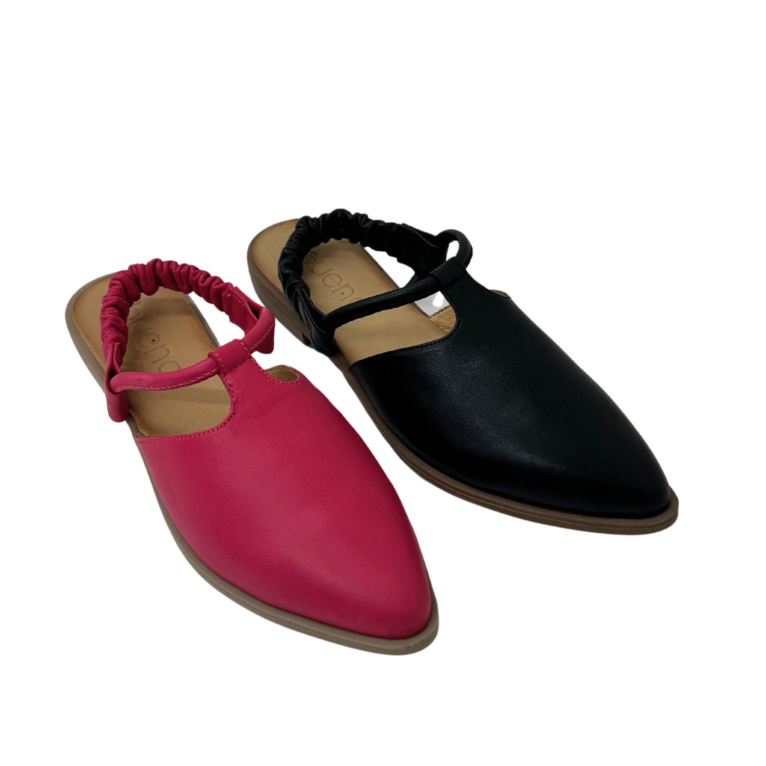 Adorable little flat shown in both a black and fuchsia leather.  Closed toe with elastic leather wrapped strap at the heel