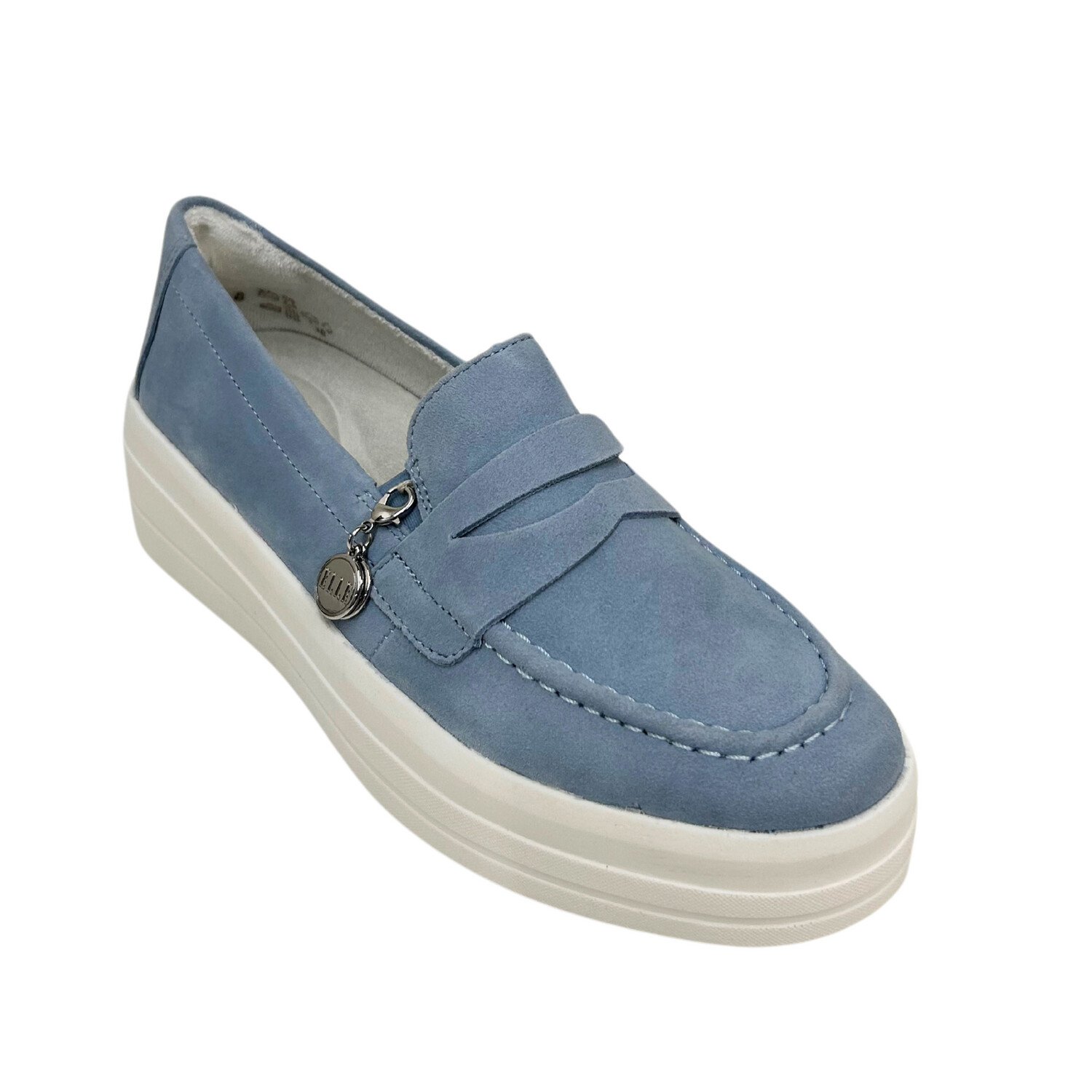 Angled view of a suede leather slip on loafer.  Flexible, white sole