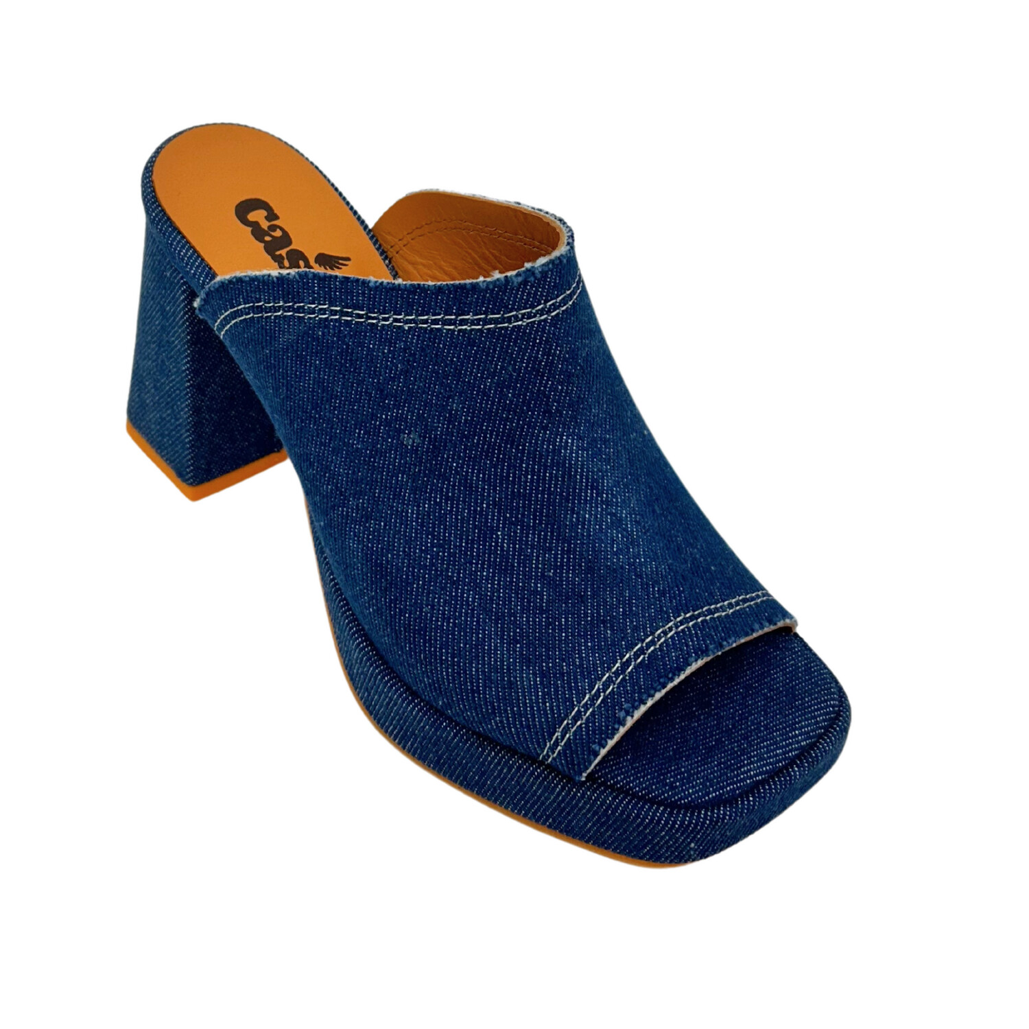 Angled view of a platform shoe in a dark denim with contrasting white stitching