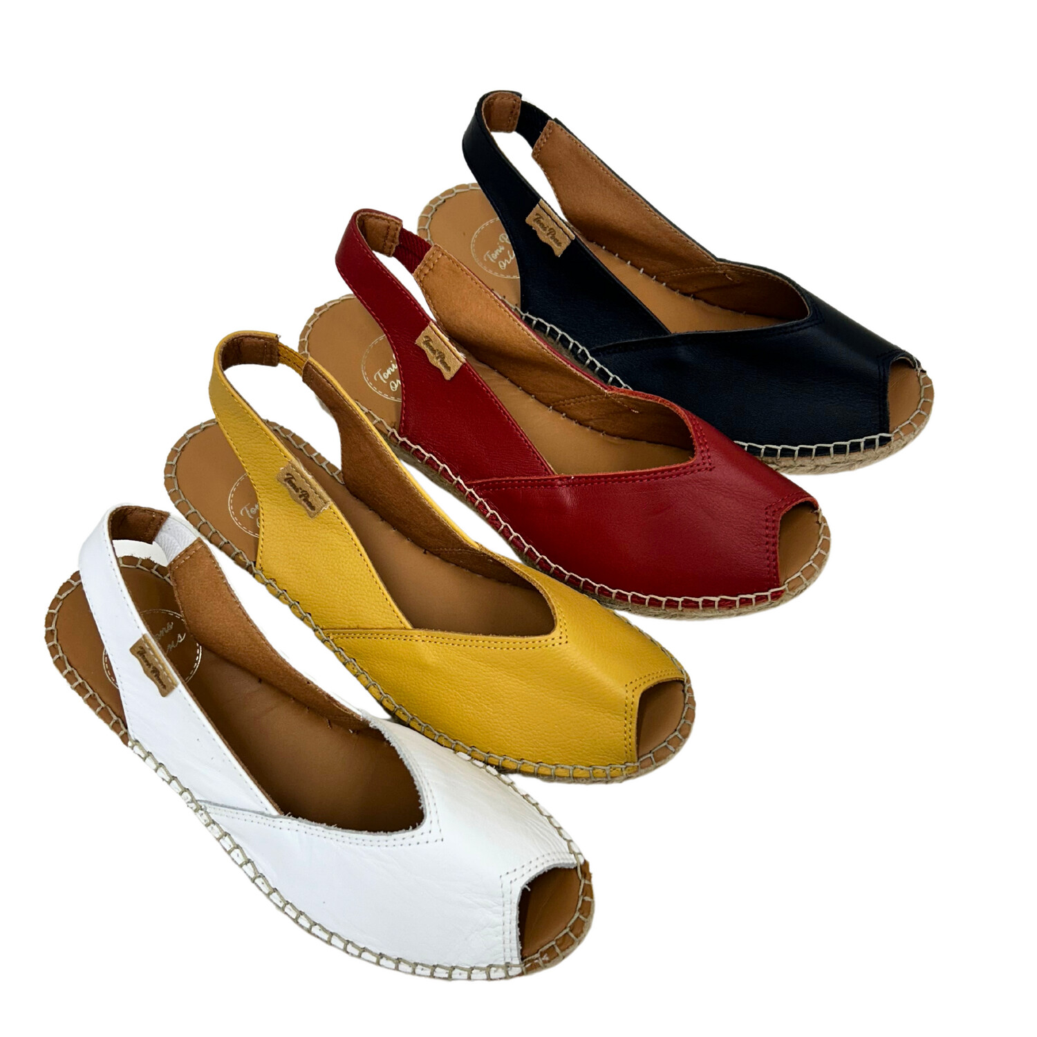 Espadrille low wedge sandal shown in white, red, yellow and navy.