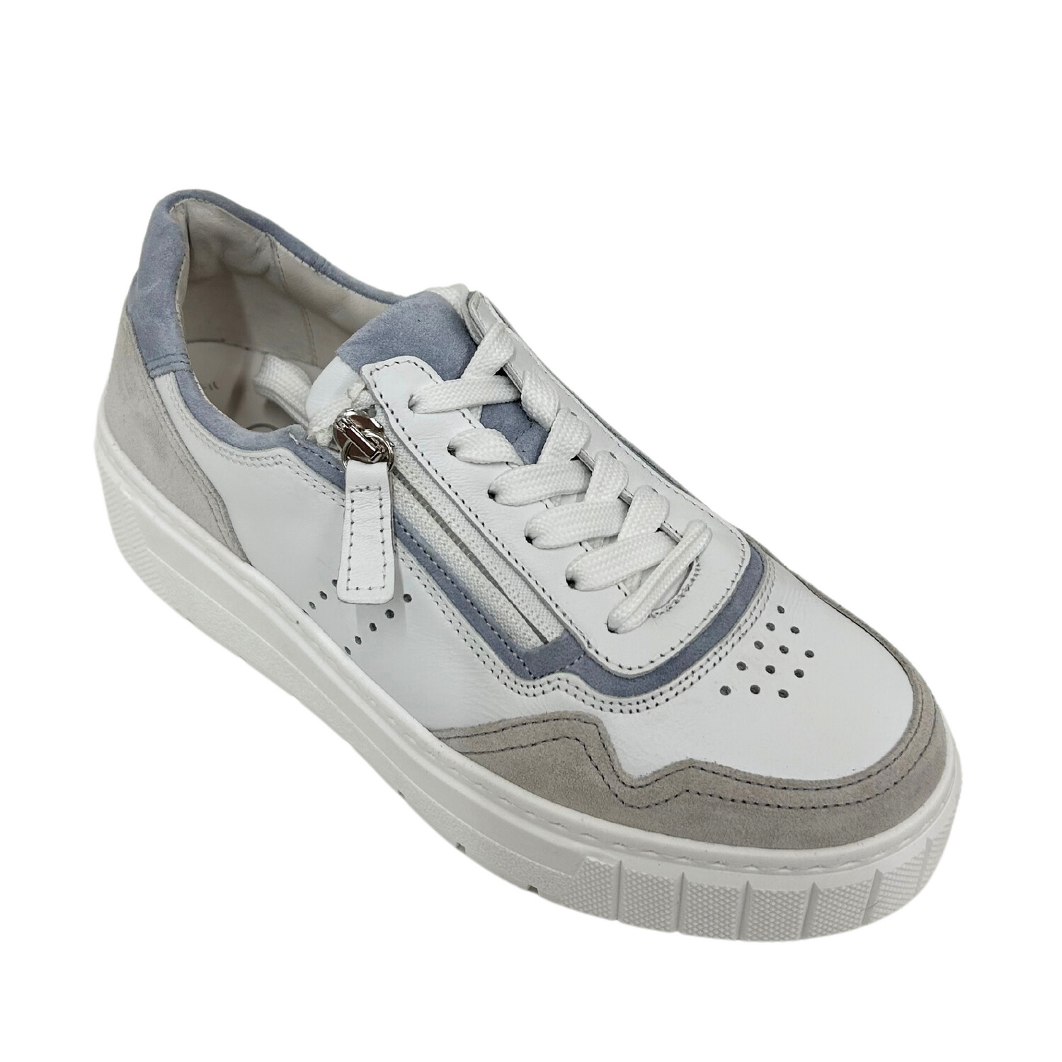 Angled front view of a white sneaker with both laces and zipper.