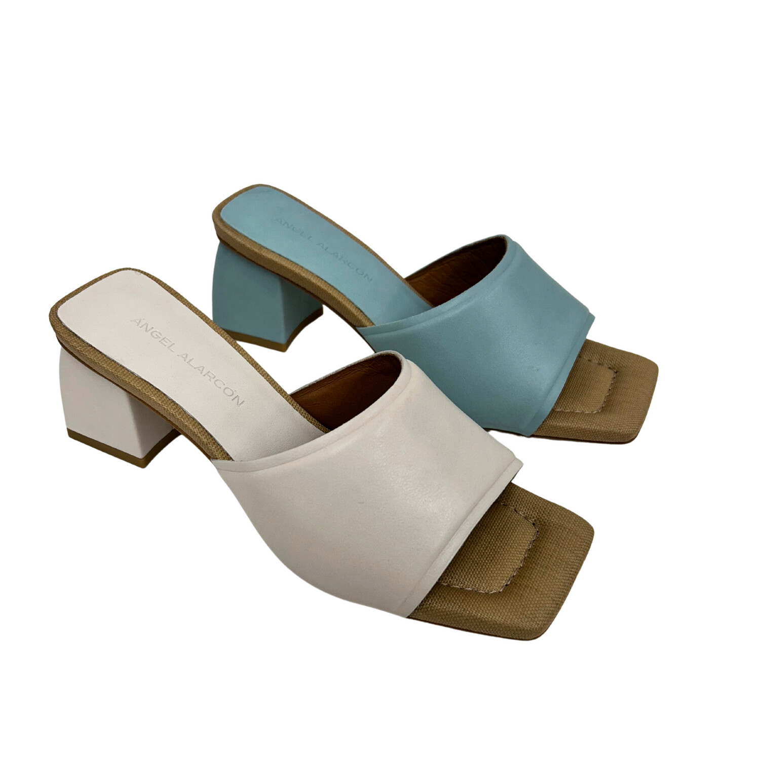 Angled side view of a warm white and robin blue slide