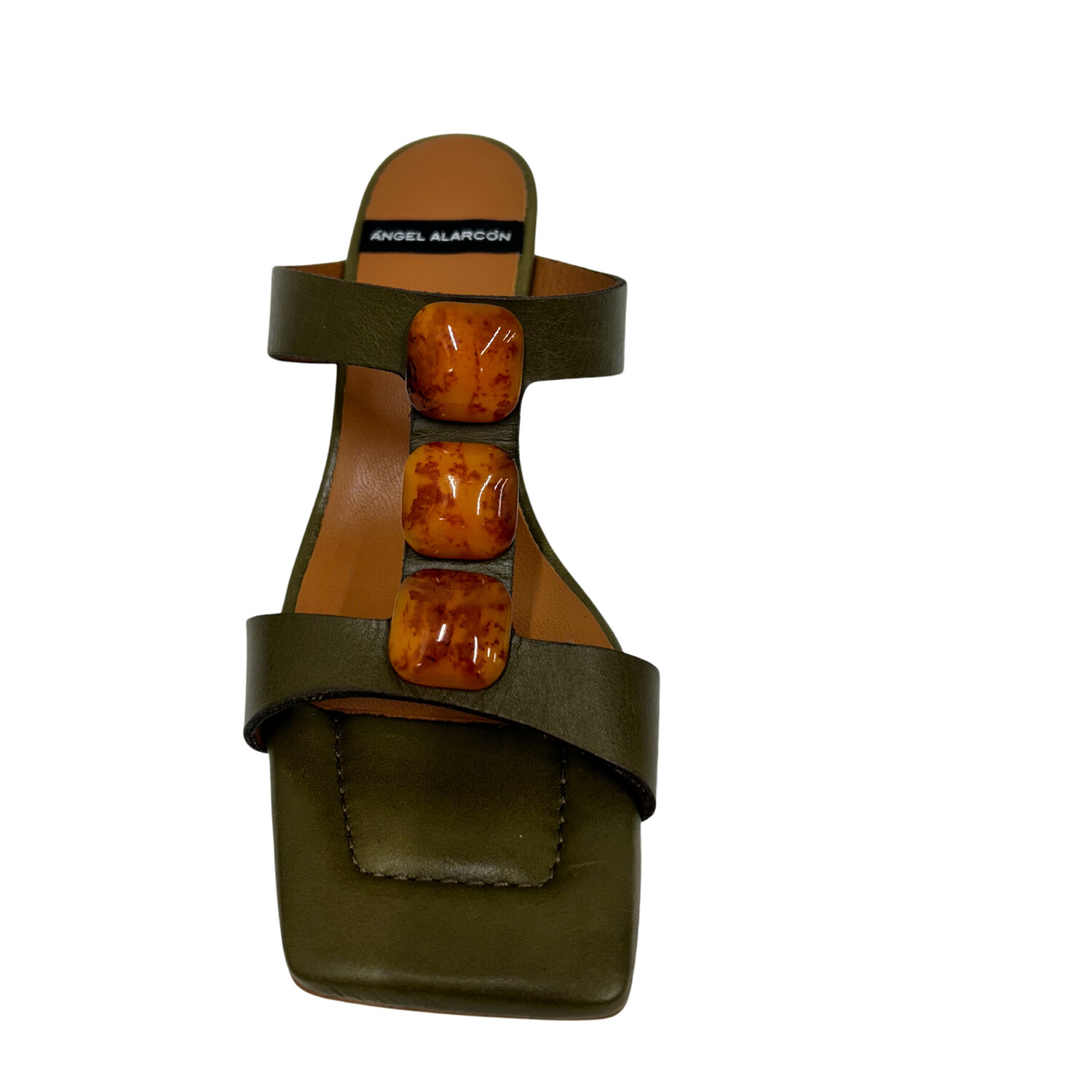 Front view of a beautiful sandal in a rich, olive green leather with tortoise buttons down front