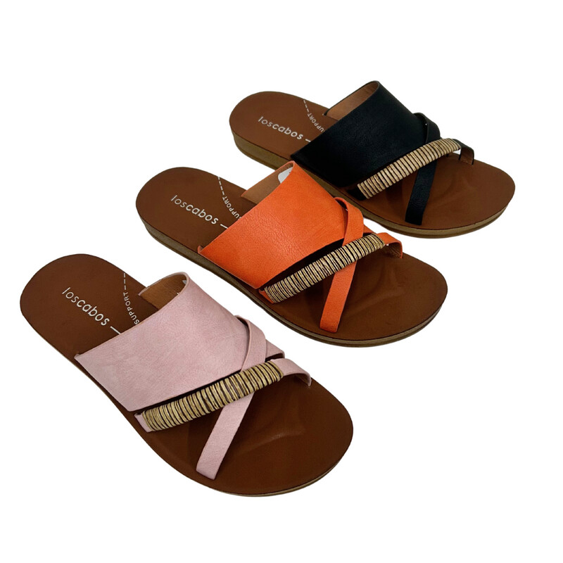 Angled front view of a flat, slip on sandal with a bohemian vibe.  Shown in soft pink, orange and black.  Vegan