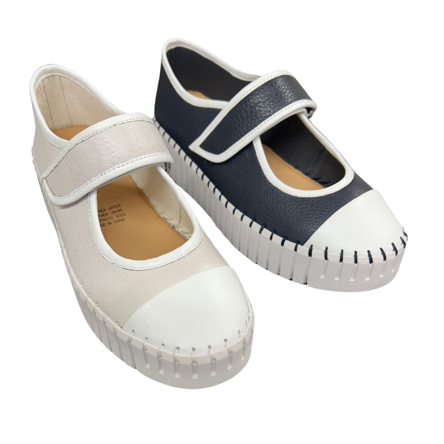 Front view of a Mary Jane sneaker in both nougat and navy.  Shop Django &amp; Juliette Berit.