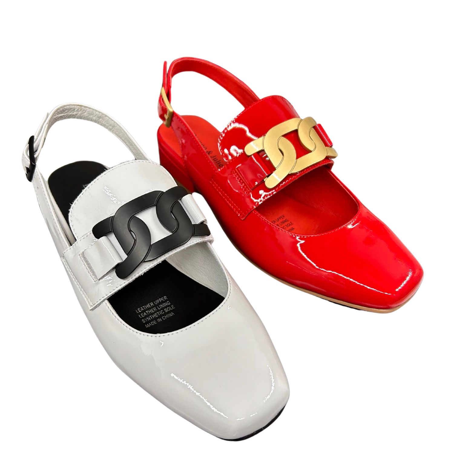Front view of a closed toe sandal.  Shown in both white with black chain detail and red patent with soft gold detail.  Shop Django &amp; Juliette Beammer.