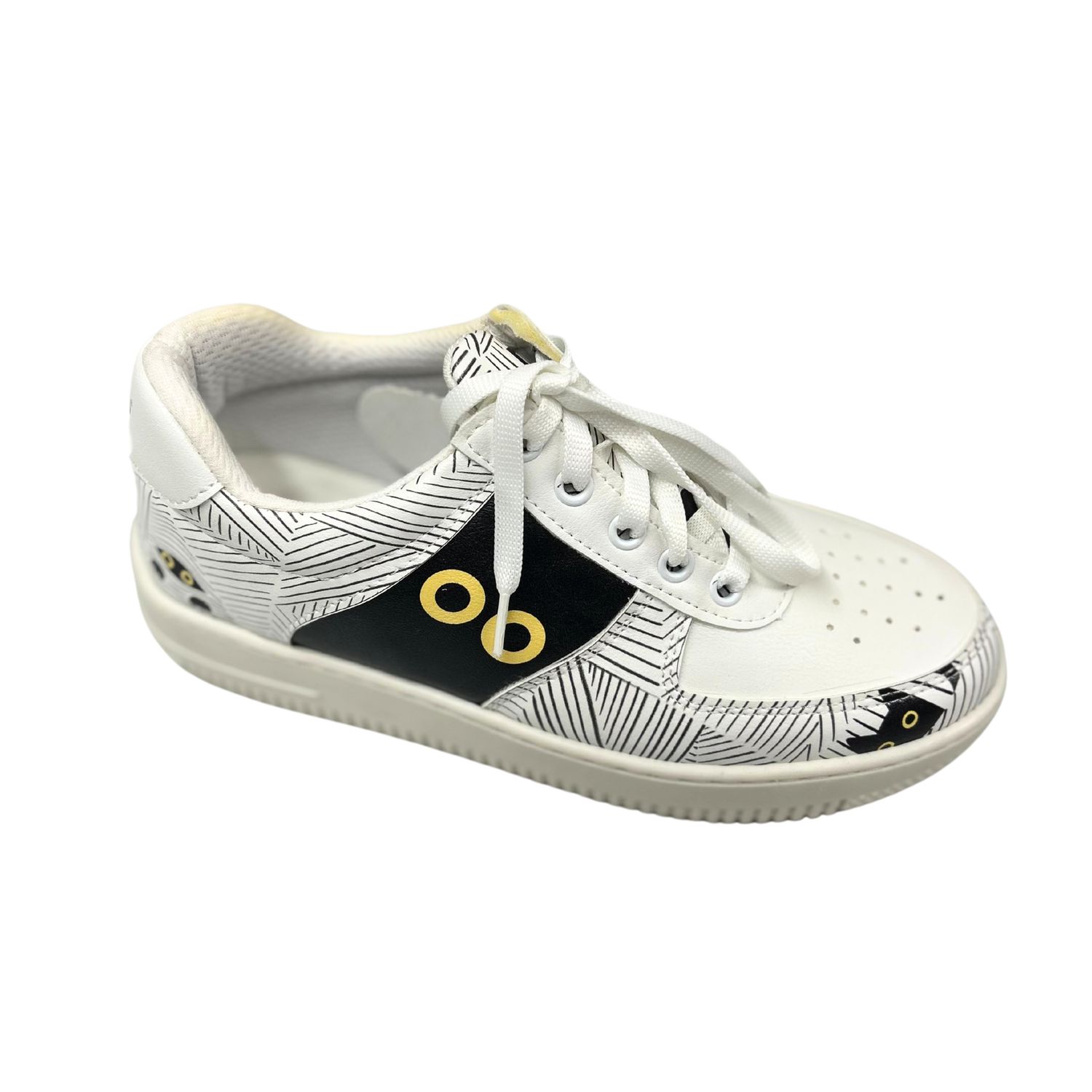 Angled front view of a white vegan sneaker with a black cat painted design.