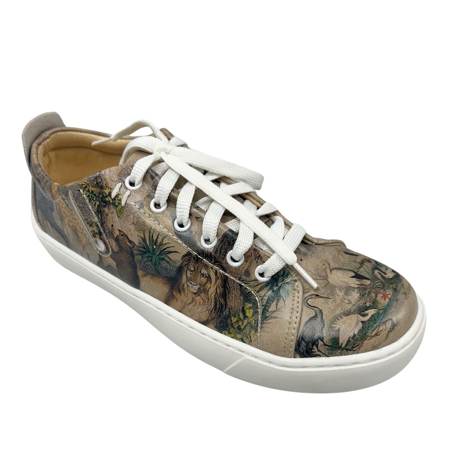 Angled front view of a vegan sneaker with a painted jungle motif