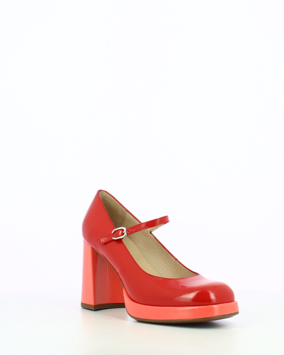 Angled front view of a platform pump with a Mary Jane strap.  Shown in a red leather upper with a coral sole and heel.
