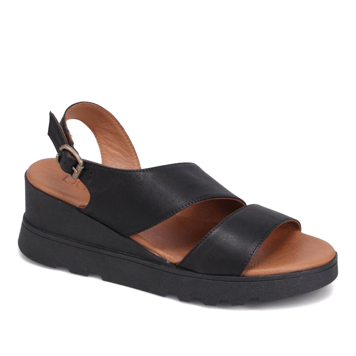 Angled front view of a black leather sandal.  Chunky feel to it as the sole is a black wedge.