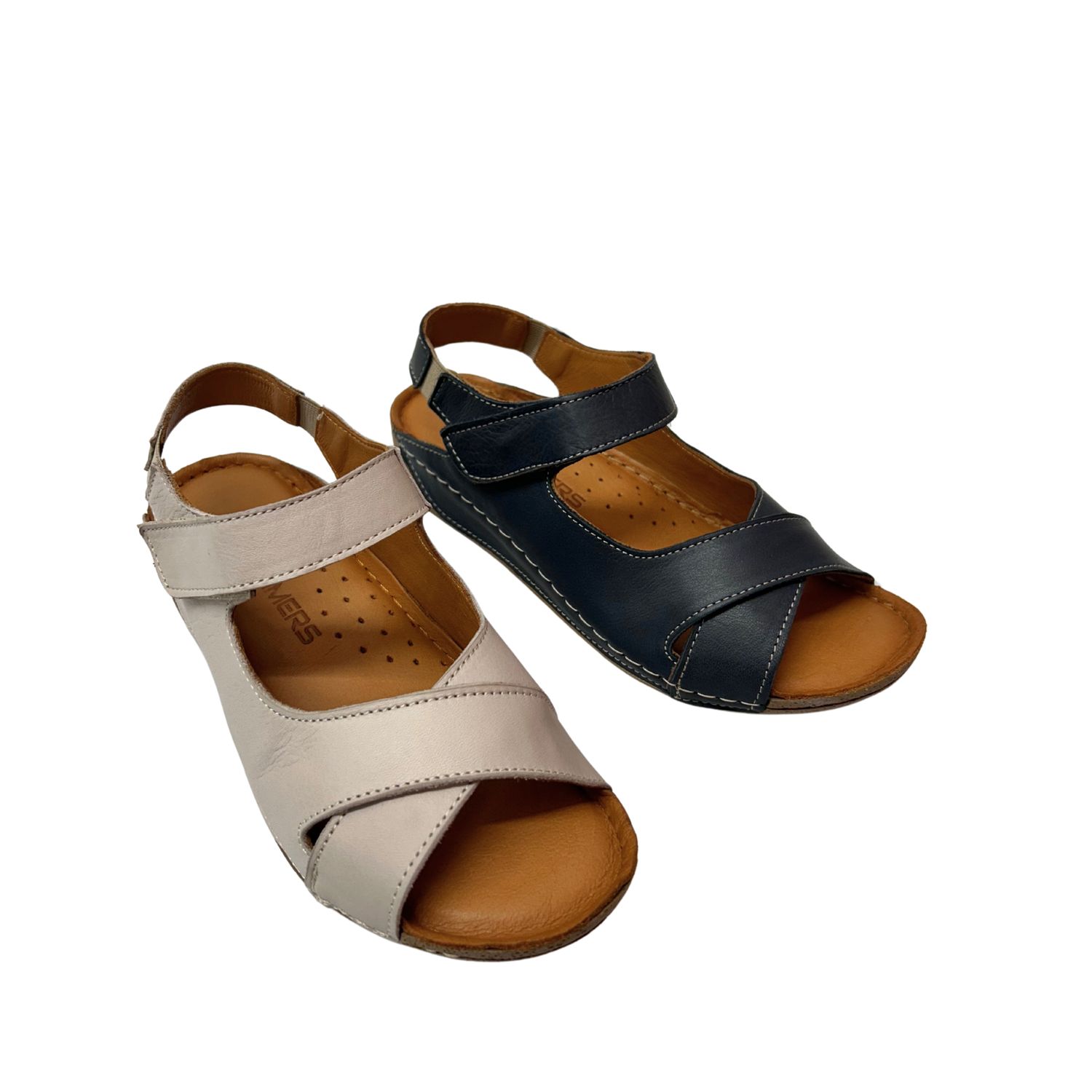 Angled front view of a sandal with great, supportive coverage on the upper.  Shown in 2 colors - beige and navy.