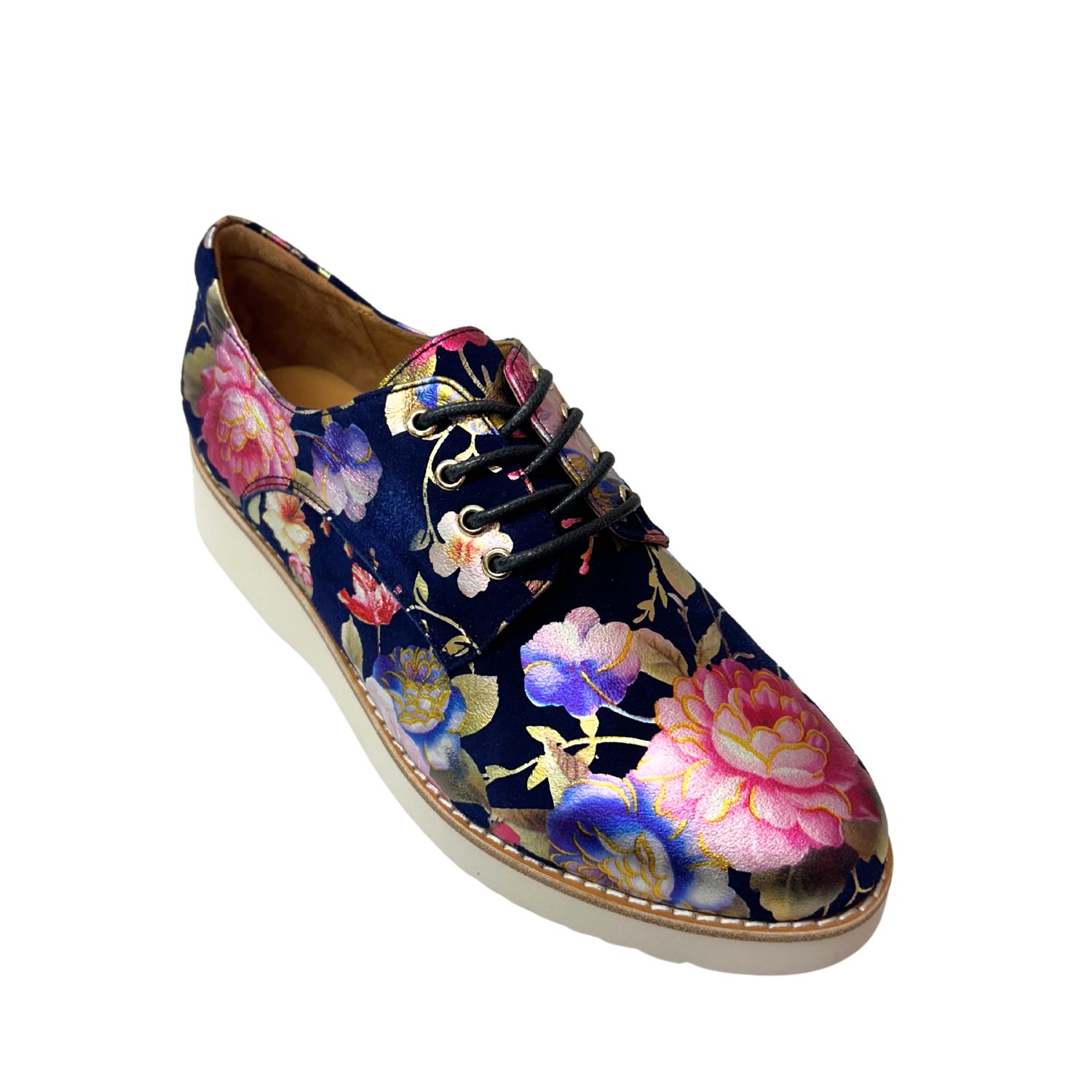 Angled front view of an oxford loafer.  Leather is a floral pattern with a navy base color. 