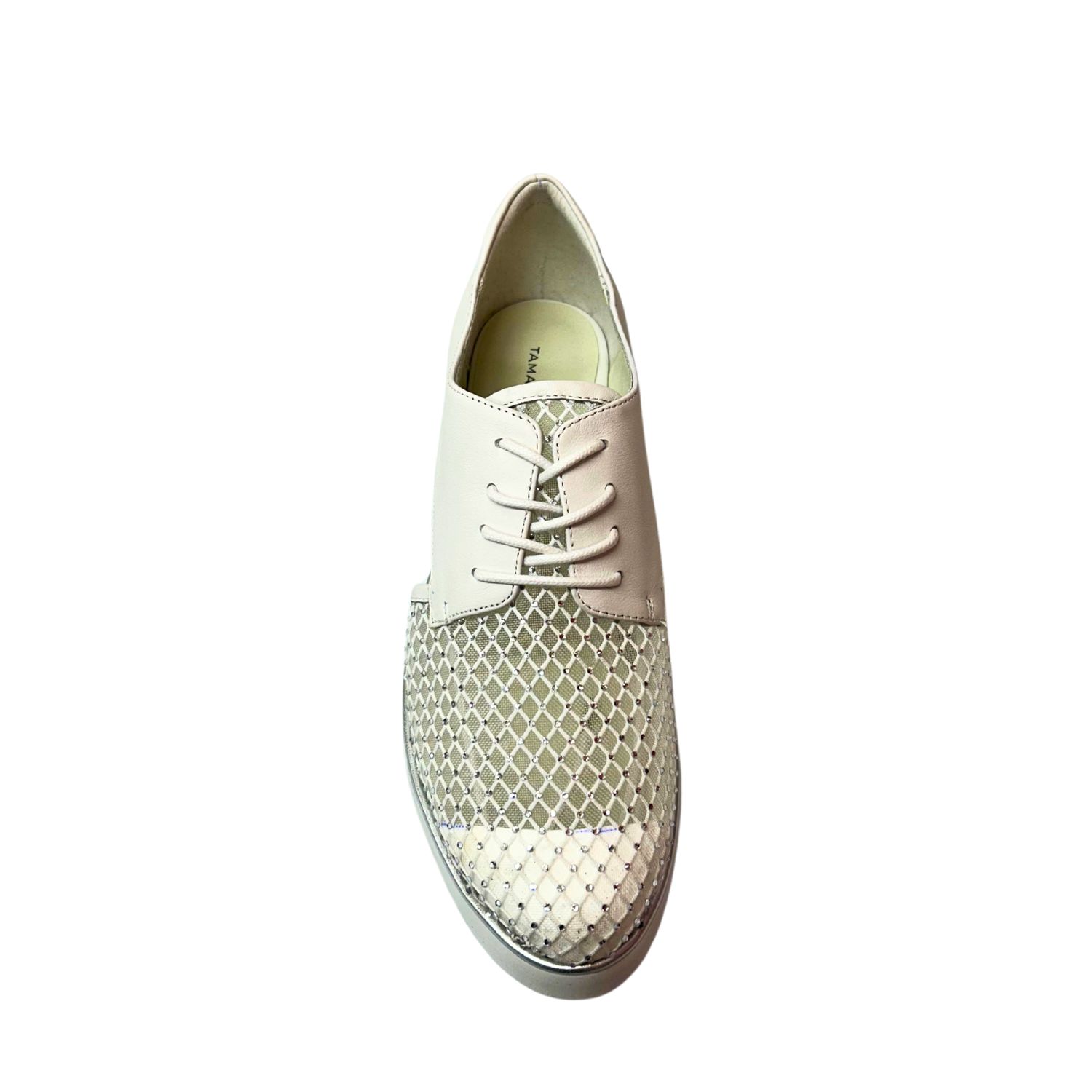 Top down view of a white, dressy oxford.  Mid-foot is a patterned mesh with tiny crystals.