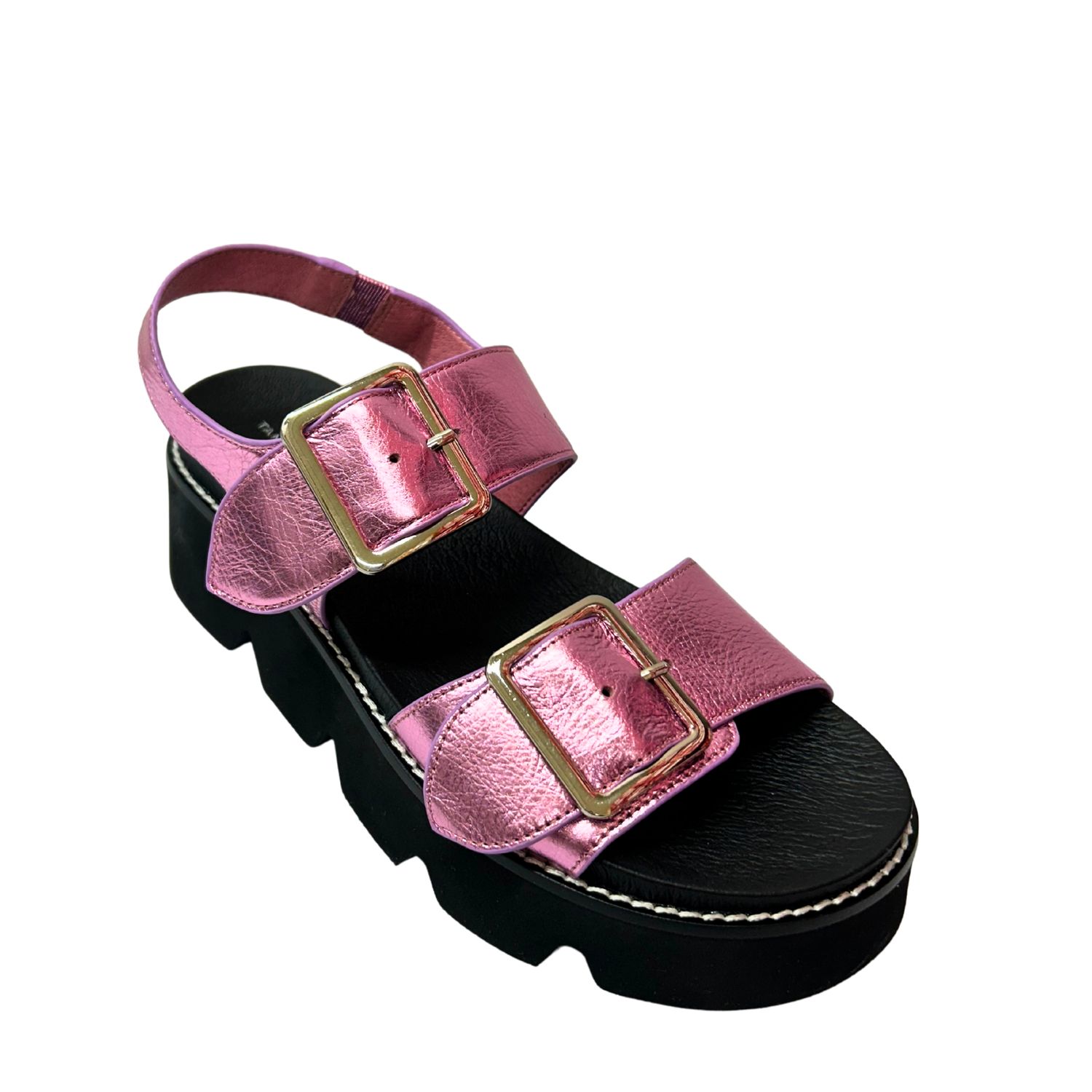 Angled front view of a chunky, black soled sandal.  Upper is done in a shimmery pink leather.  Double straps both have buckles to adjust the fit.