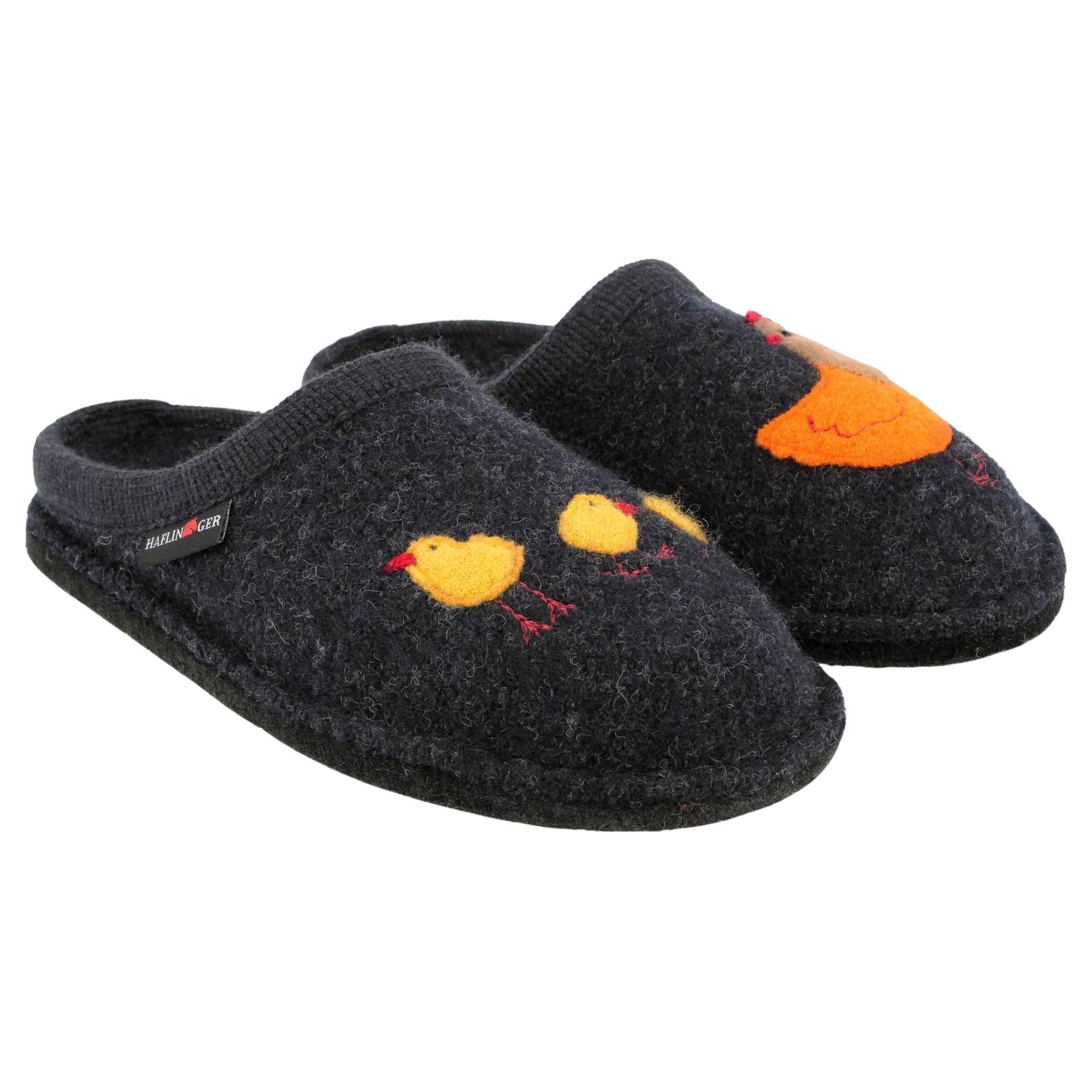 Pair of boiled wool slippers.  The left one has a hen on it and the right one has 3 little chicks.