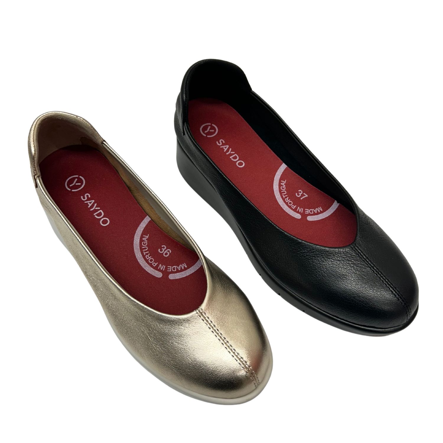 Angled front view of a ballet flat.  There are 2 colors shown - black leather and soft gold leather.