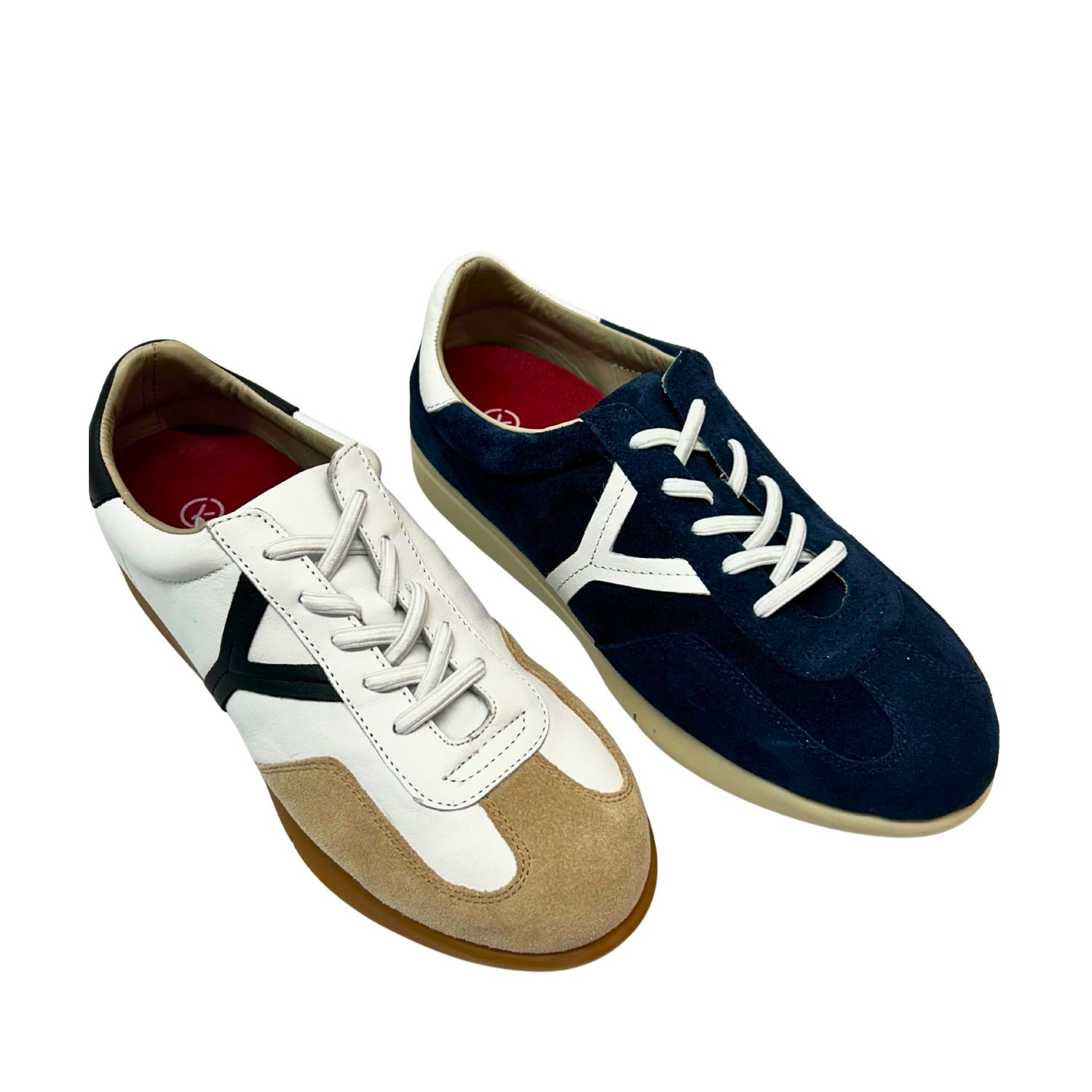 Angled front view of a retro style sneaker in suede.  Shown in 2 colors - denim blue and off white.
