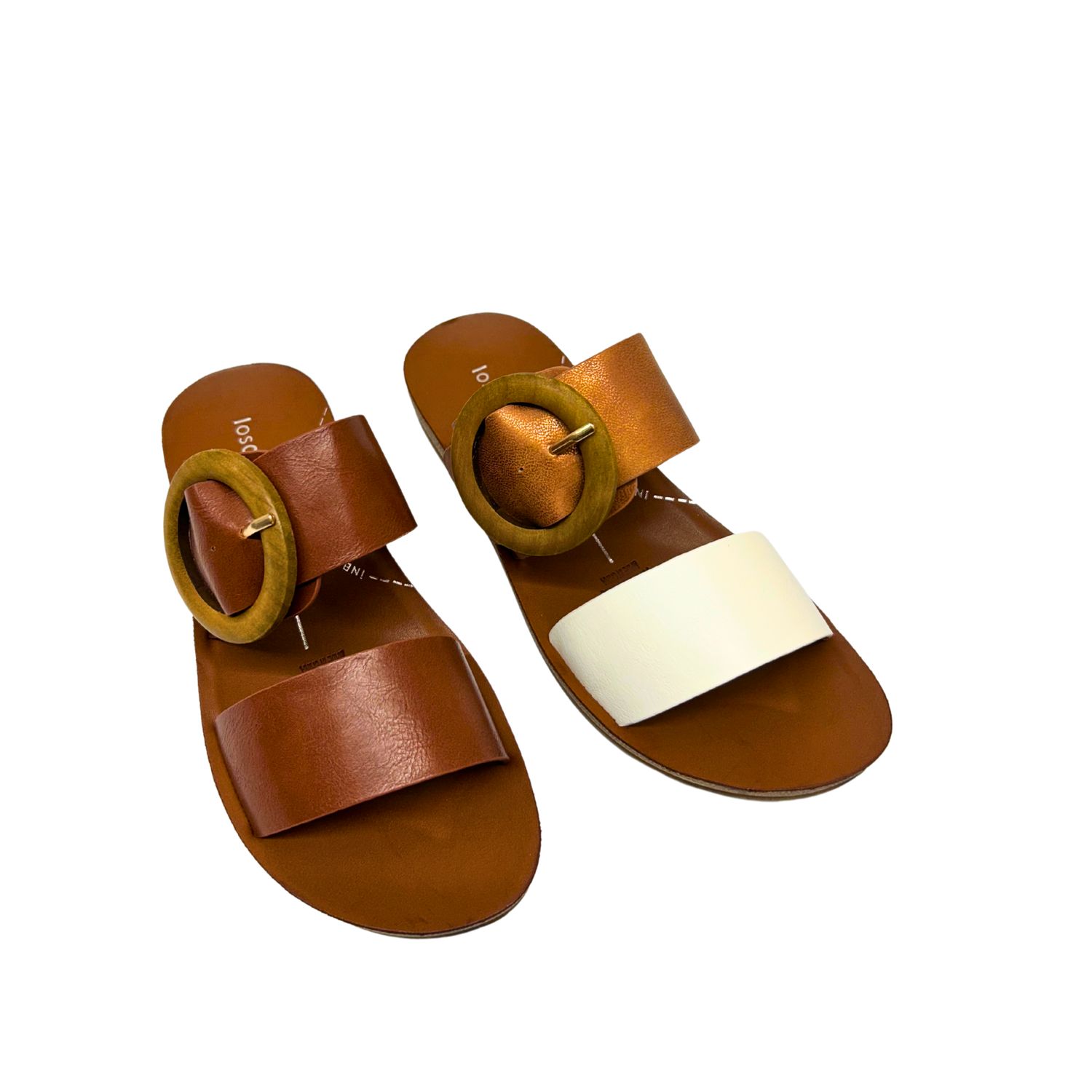 Flat, walking sandal with 2 thick straps.  Open toe and heel.  Shown in a cognac color and a bronze/white combination.  Non-leather product.