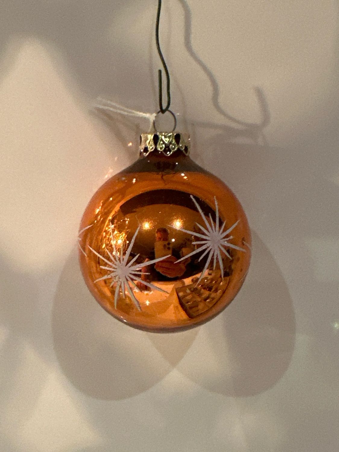 Oranje ster kerstbal / 7 cm