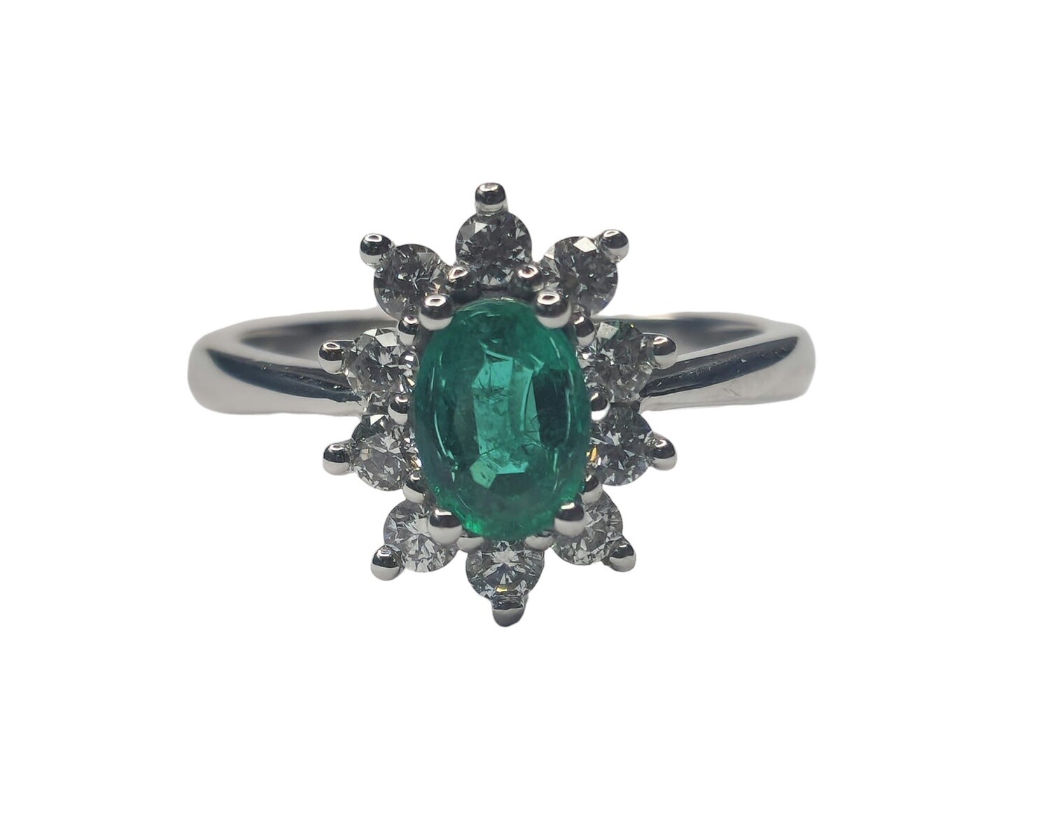 18ct white gold and emerald flower style ring