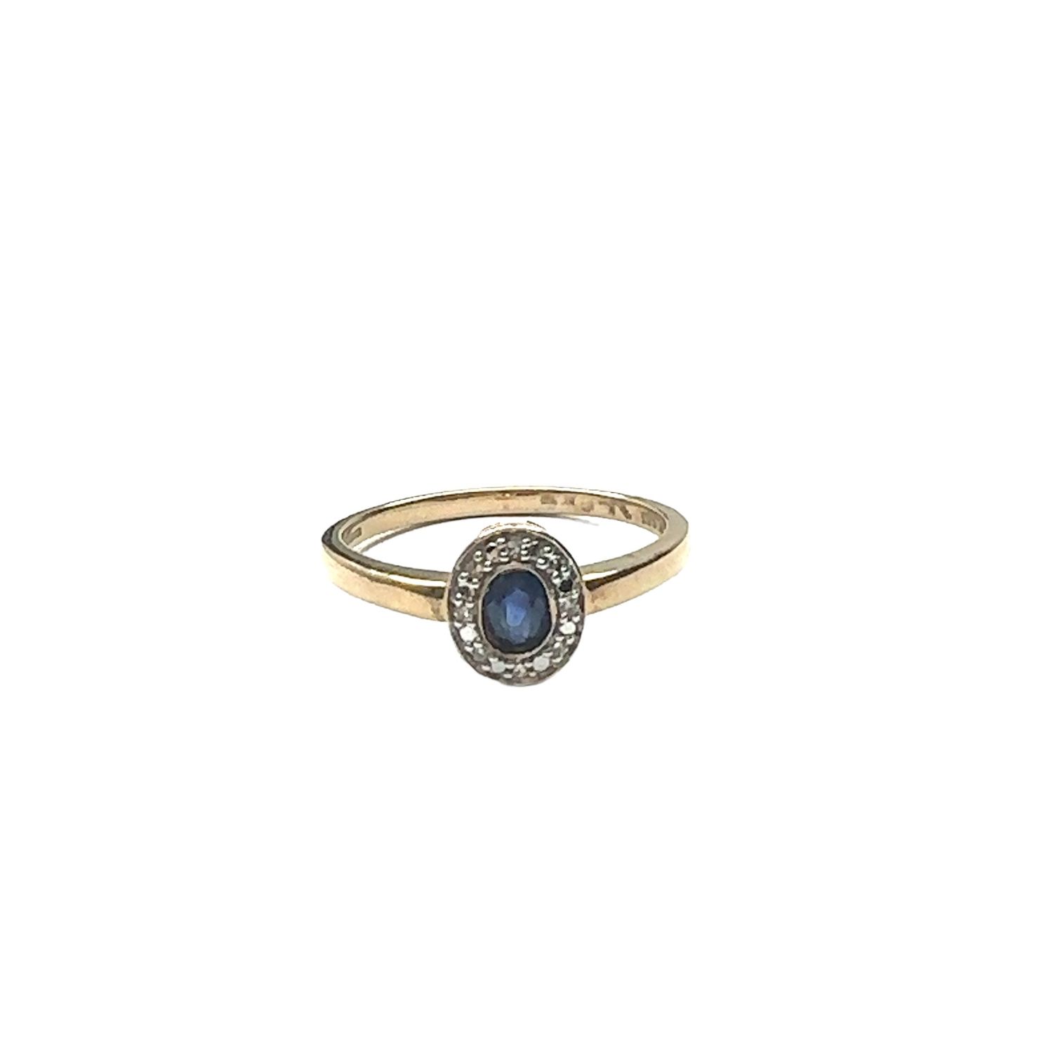 9ct yellow gold diamond and centre sapphire ring