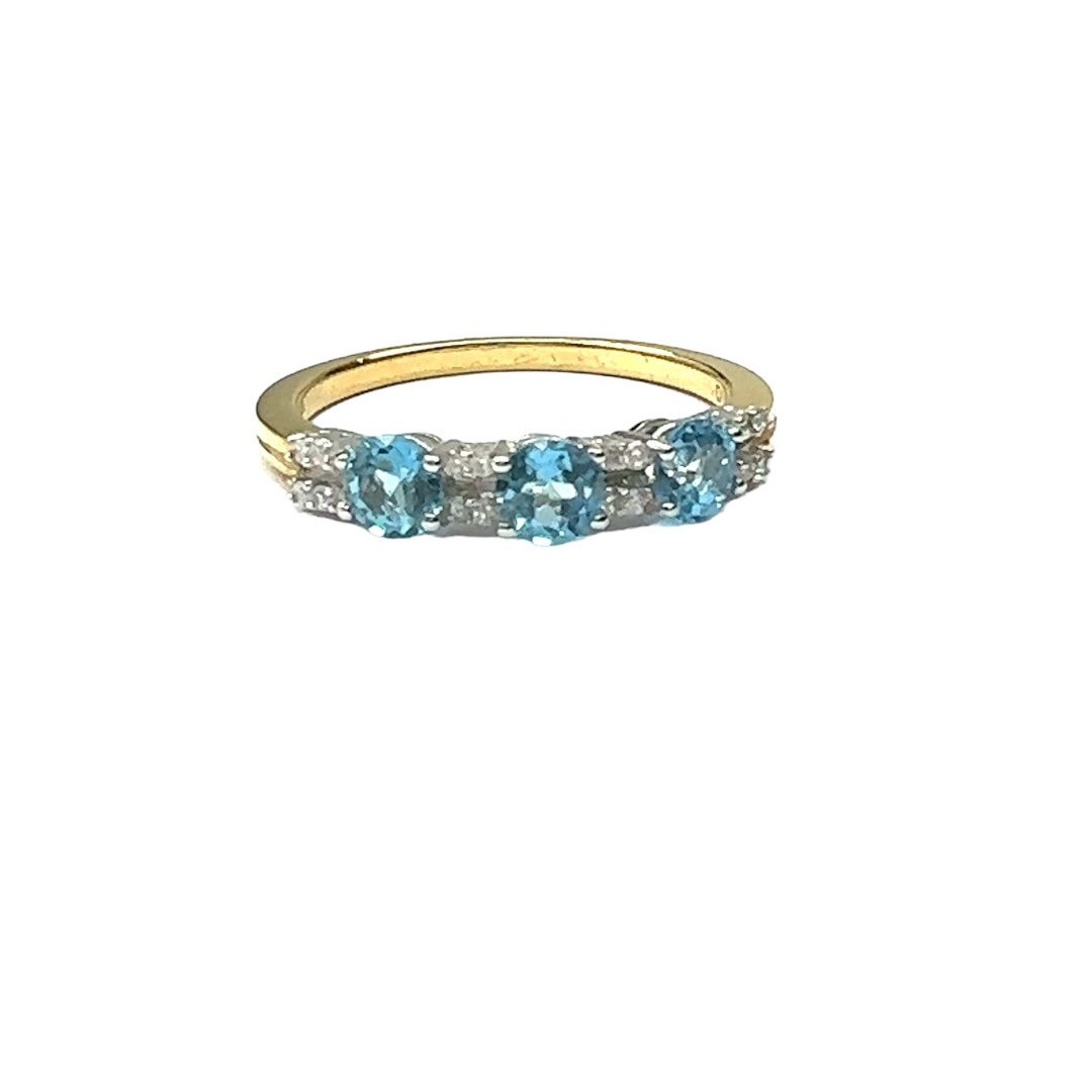 18ct yellow gold aquamarine and diamond set ring