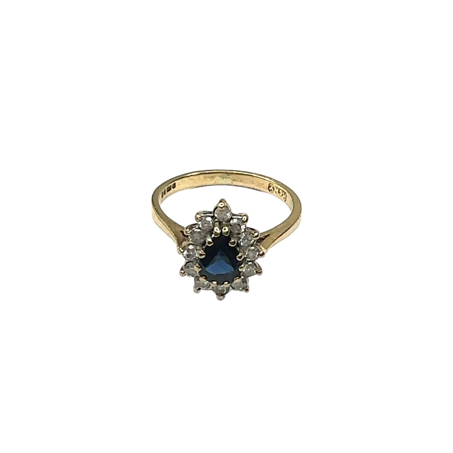 9ct yellow gold diamond and blue sapphire flower style ring