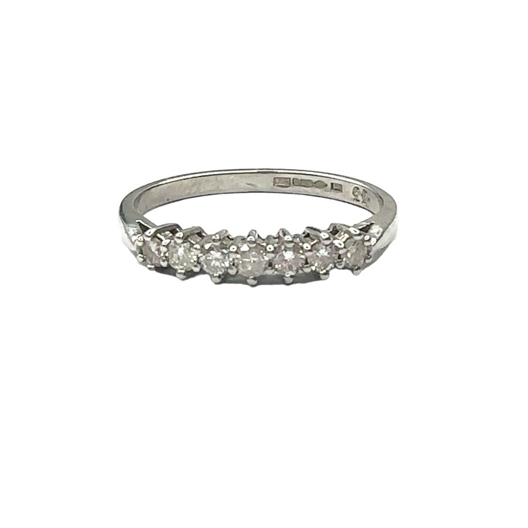 Platinum 7 diamond set ring