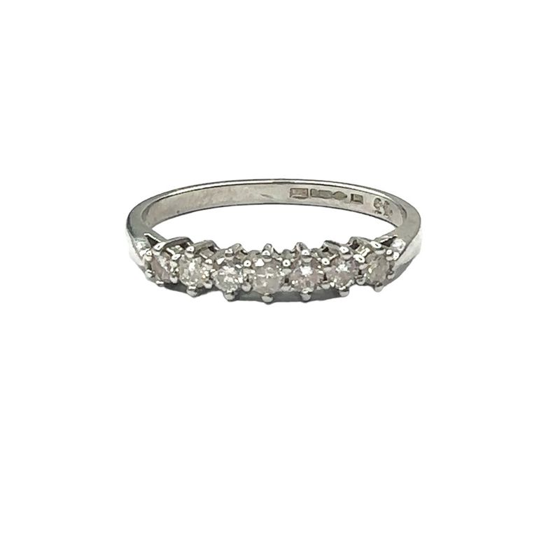 Platinum 7 diamond set ring