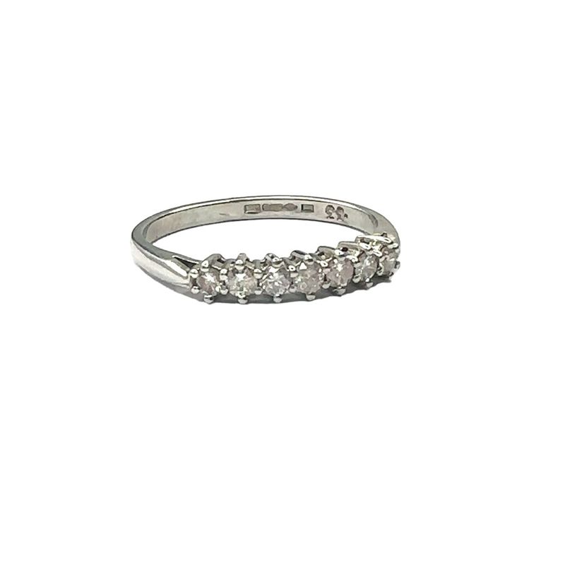 Platinum 7 diamond set ring