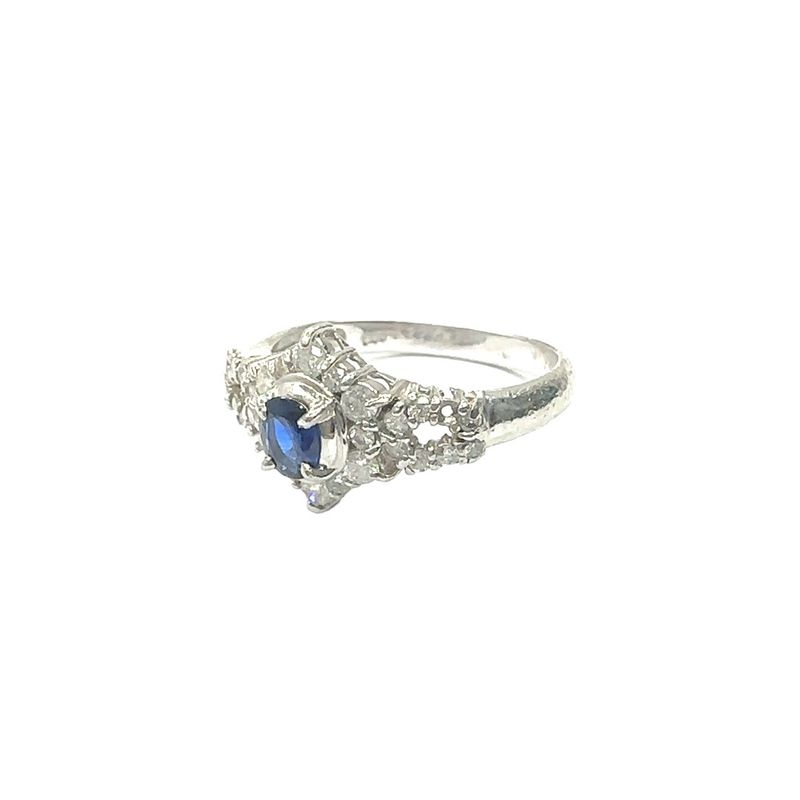Diamond and sapphire set platinum ring