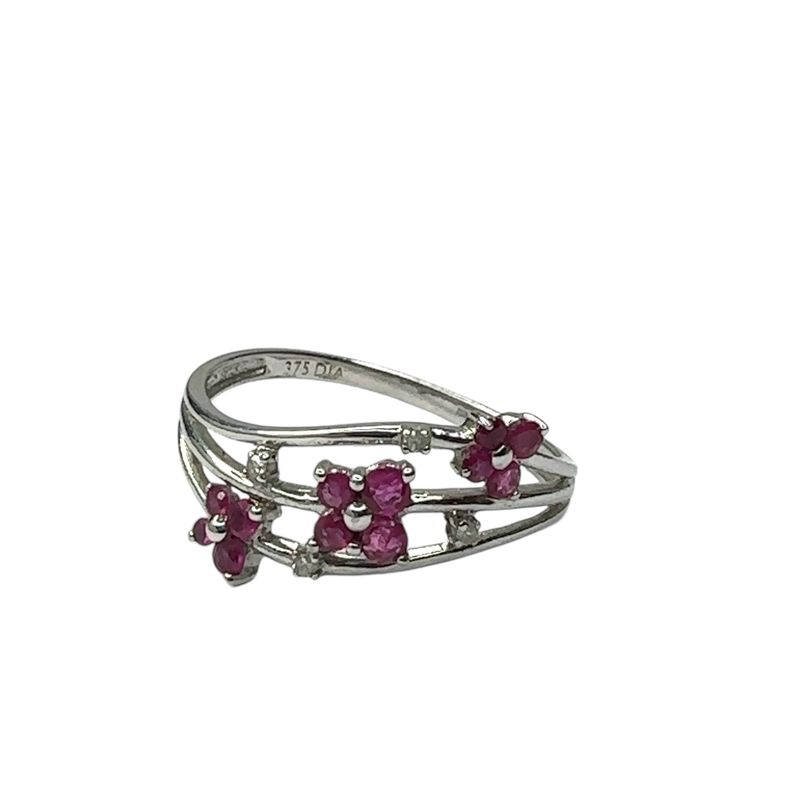 9ct  white gold ruby and diamond 0.08ct set flower ring