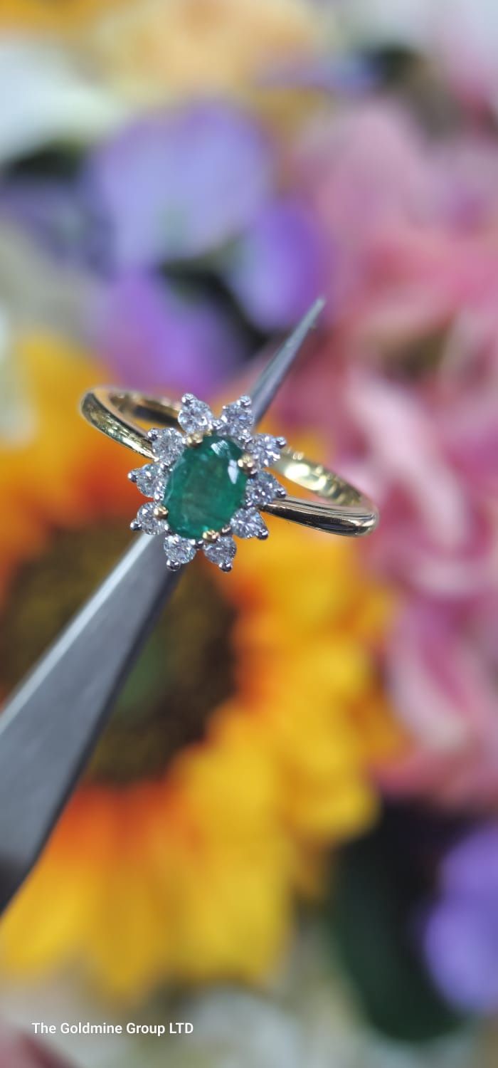 18ct yellow gold diamond and emerald set ring