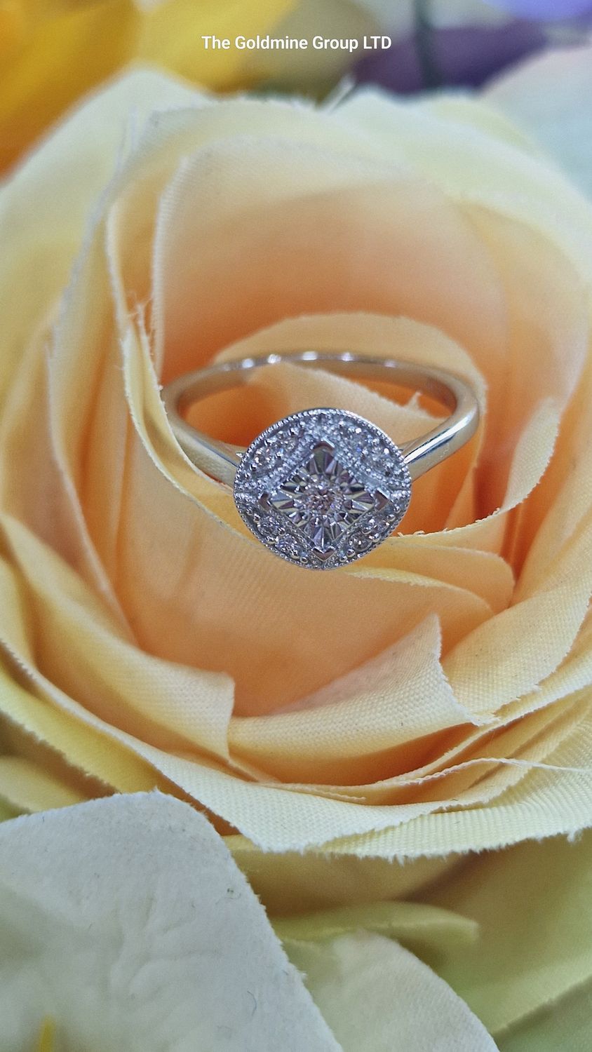 White Gold Diamond Circular scatter ring STE491
