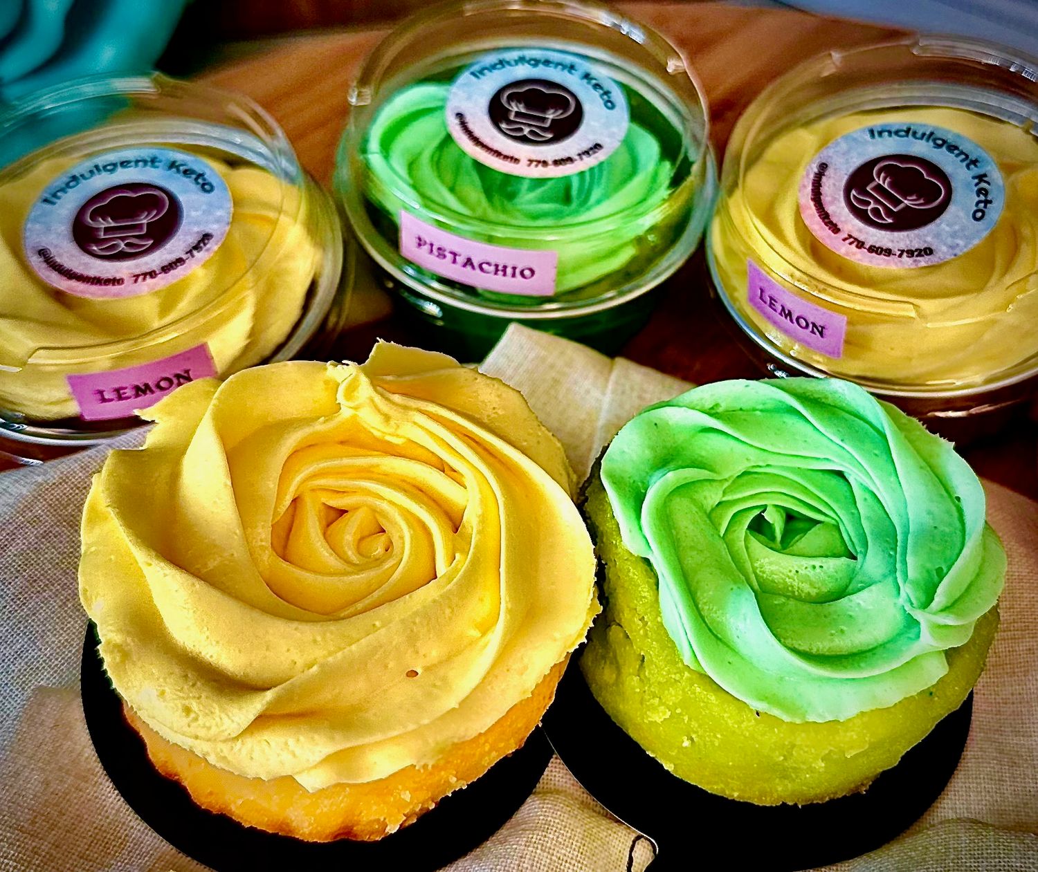 Low carb lemon cupcakes, and pistachio cupcakes, made without erythritol. Lemon features a light, fluffy texture and a burst of fresh lemon flavor. Pistachio are topped with crushed pistachios.