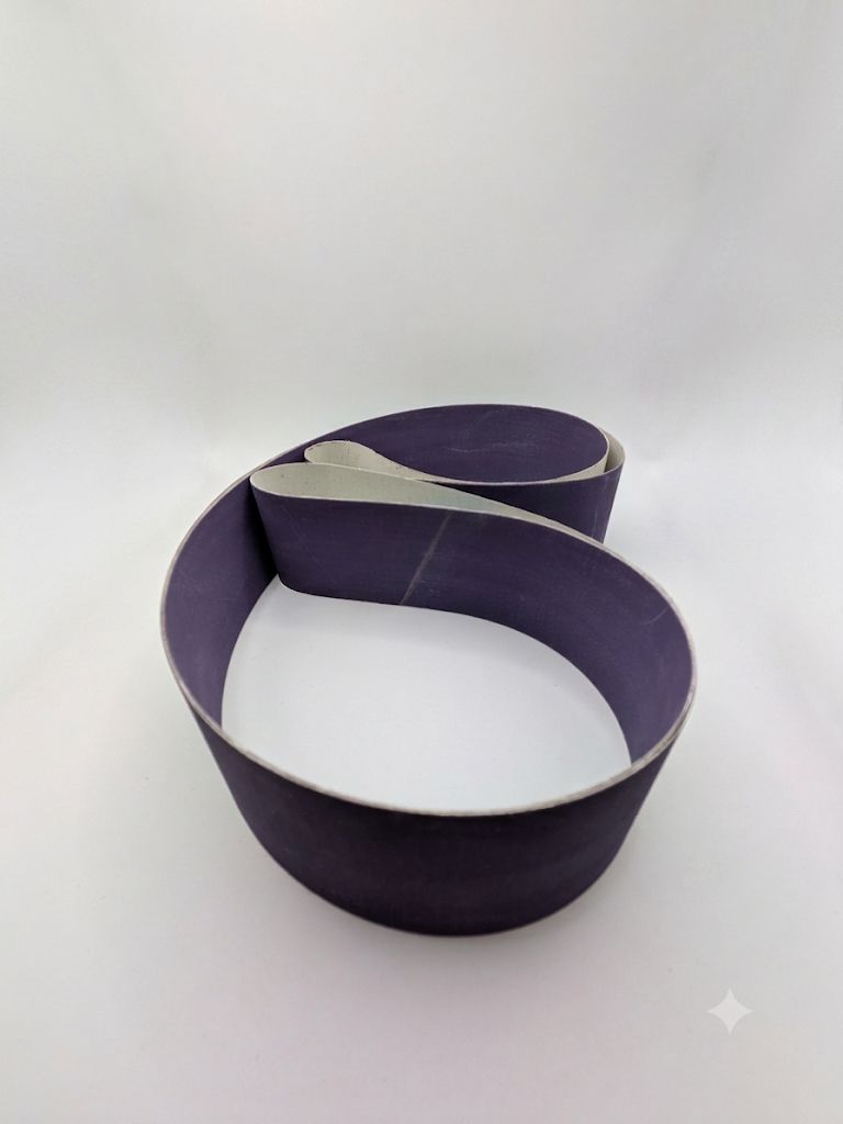 Premium 2x72 purple ceramic sanding belt with triangular precision-shaped grain for heavy stock removal and knife making.