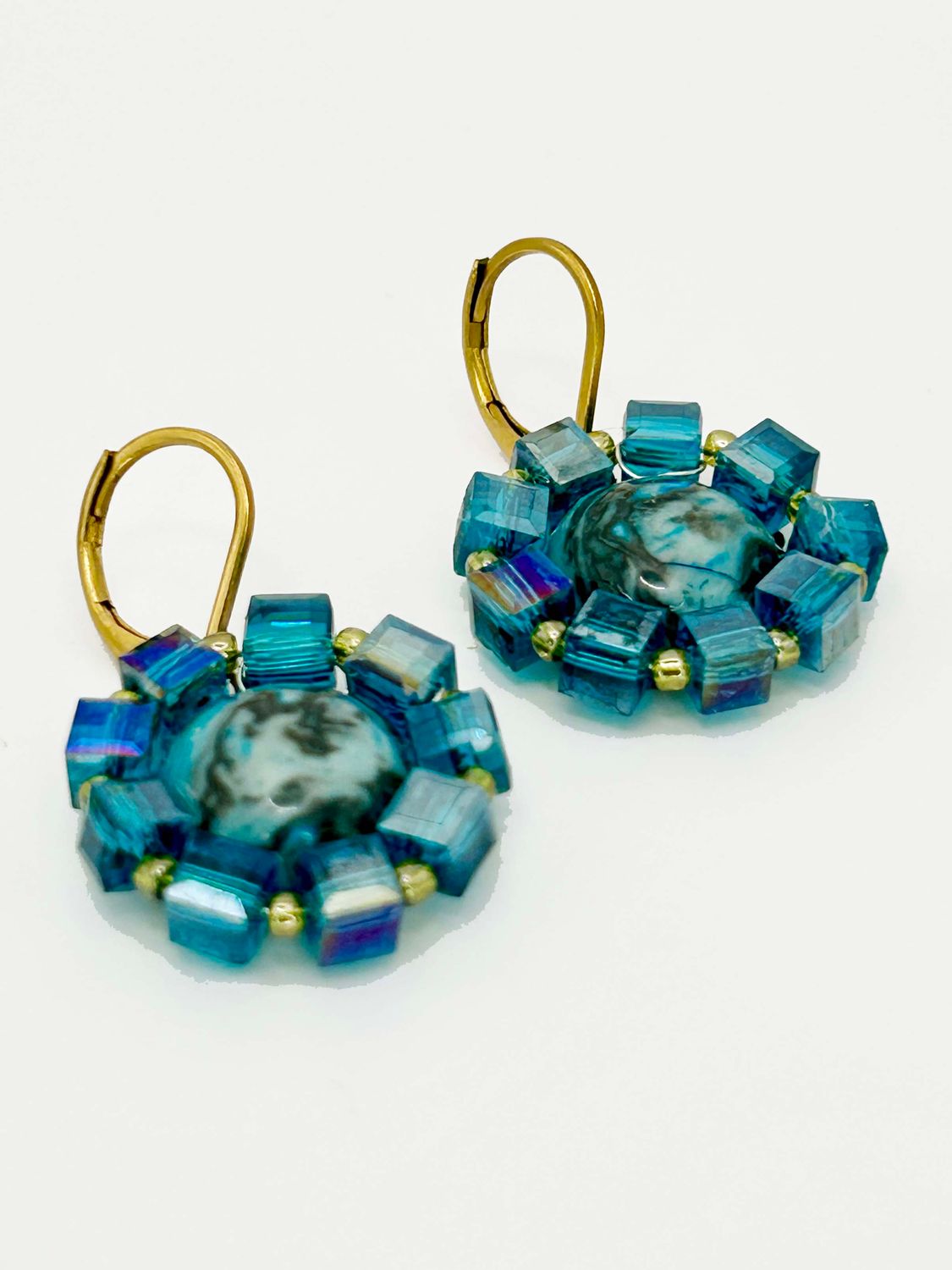 Lulua, gold colored stainless steel ear hook with blue Agate.