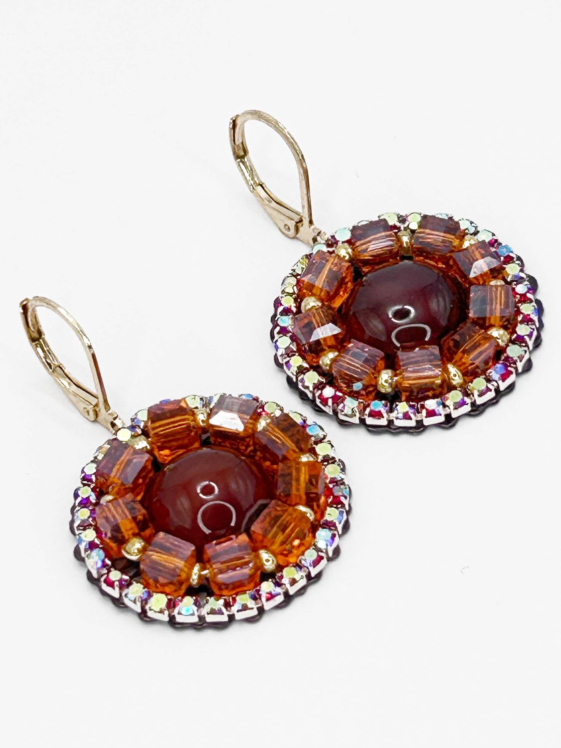 Malua, gold colored stainless steel ear hook with red Onyx.
