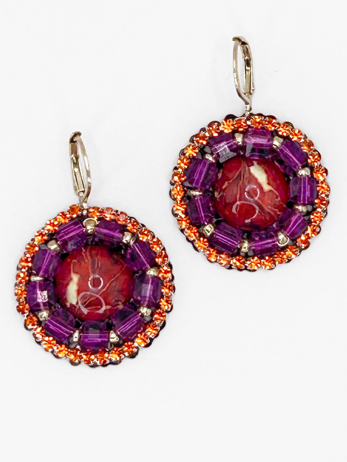 Malua, gold colored stainless steel ear hook with red fantasy eye.