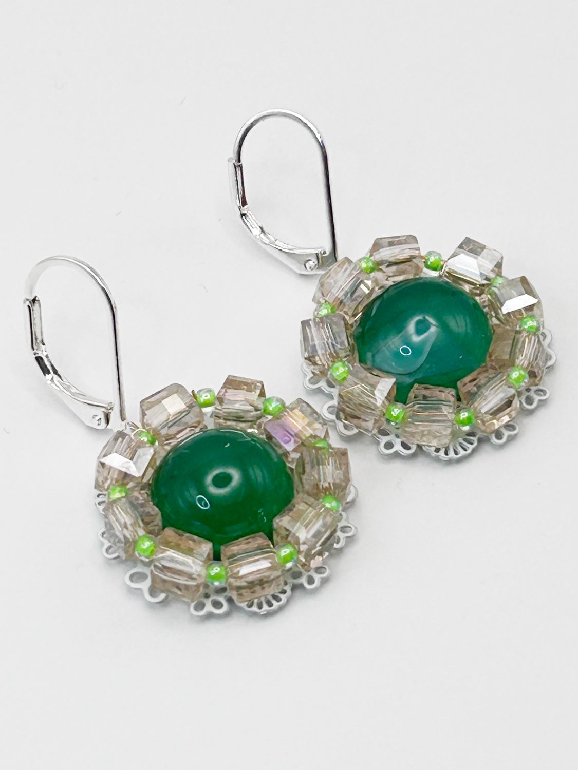 Lulua, silver colored stainless steel ear hook with Jade.