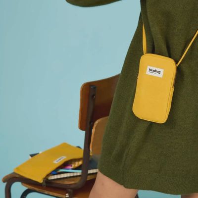 HINDBAG Bill phonepouch safraangeel
