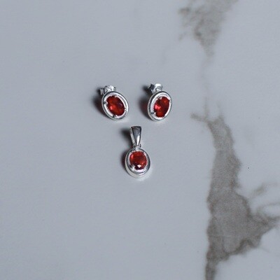 Juego zirconia roja ovalada con marco en plata italiana