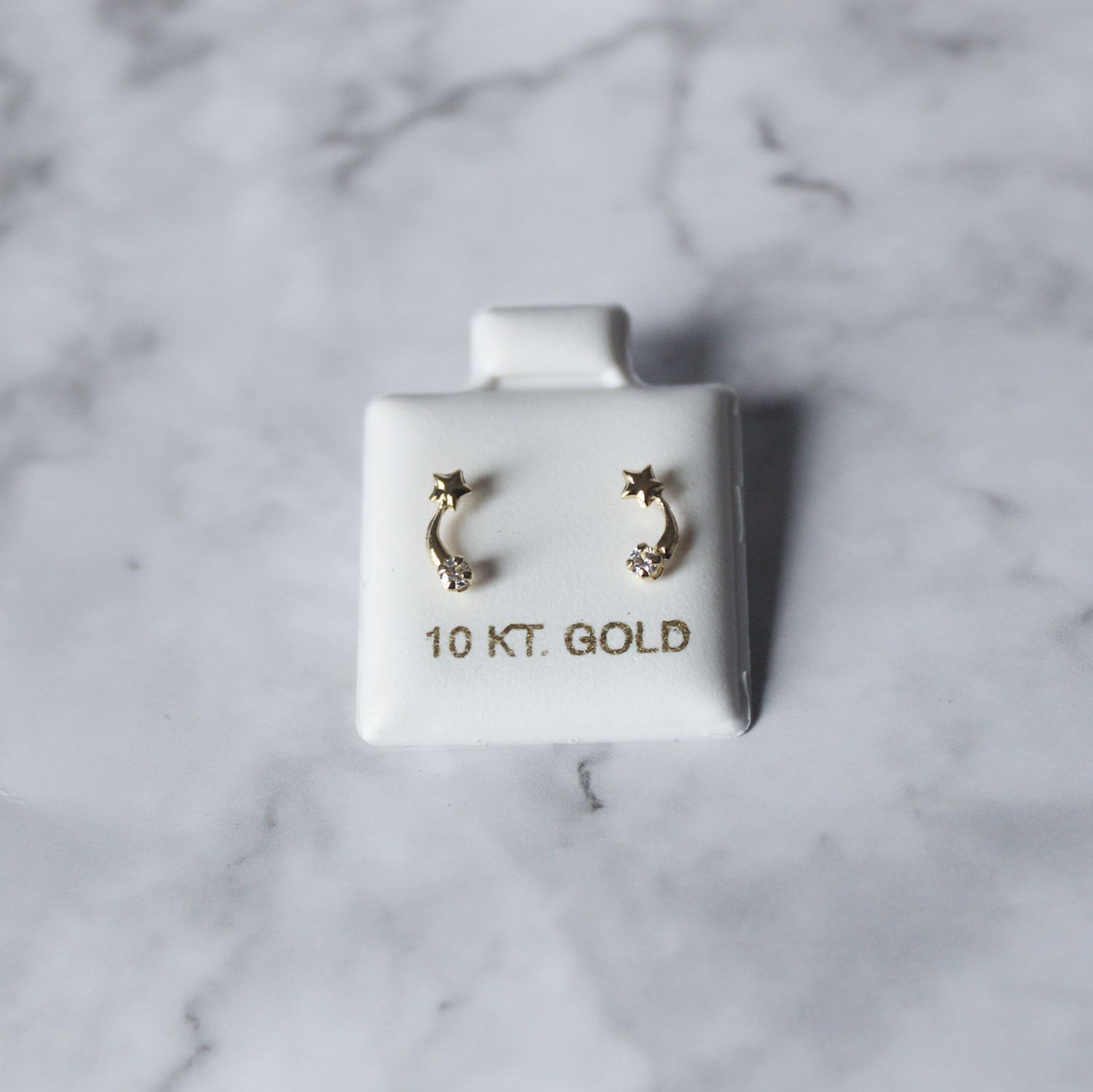 Aretes estrella fugas en oro 10KT