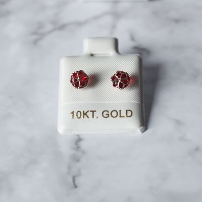 Arete Flor con zirconia roja y en oro 10KT