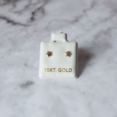Aretes de estrella mini en Oro 10KT