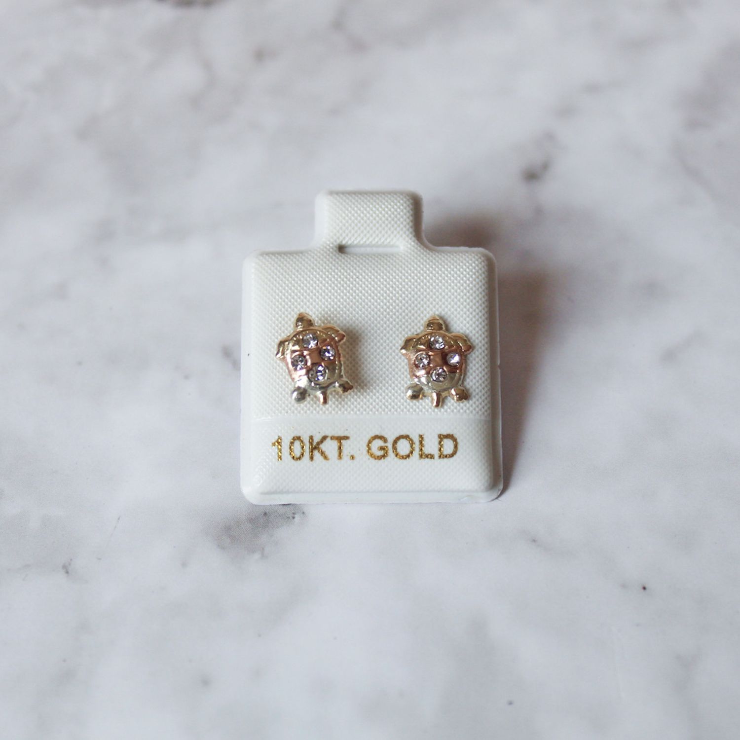 Aretes de tortuga con zirconia en Oro 10KT